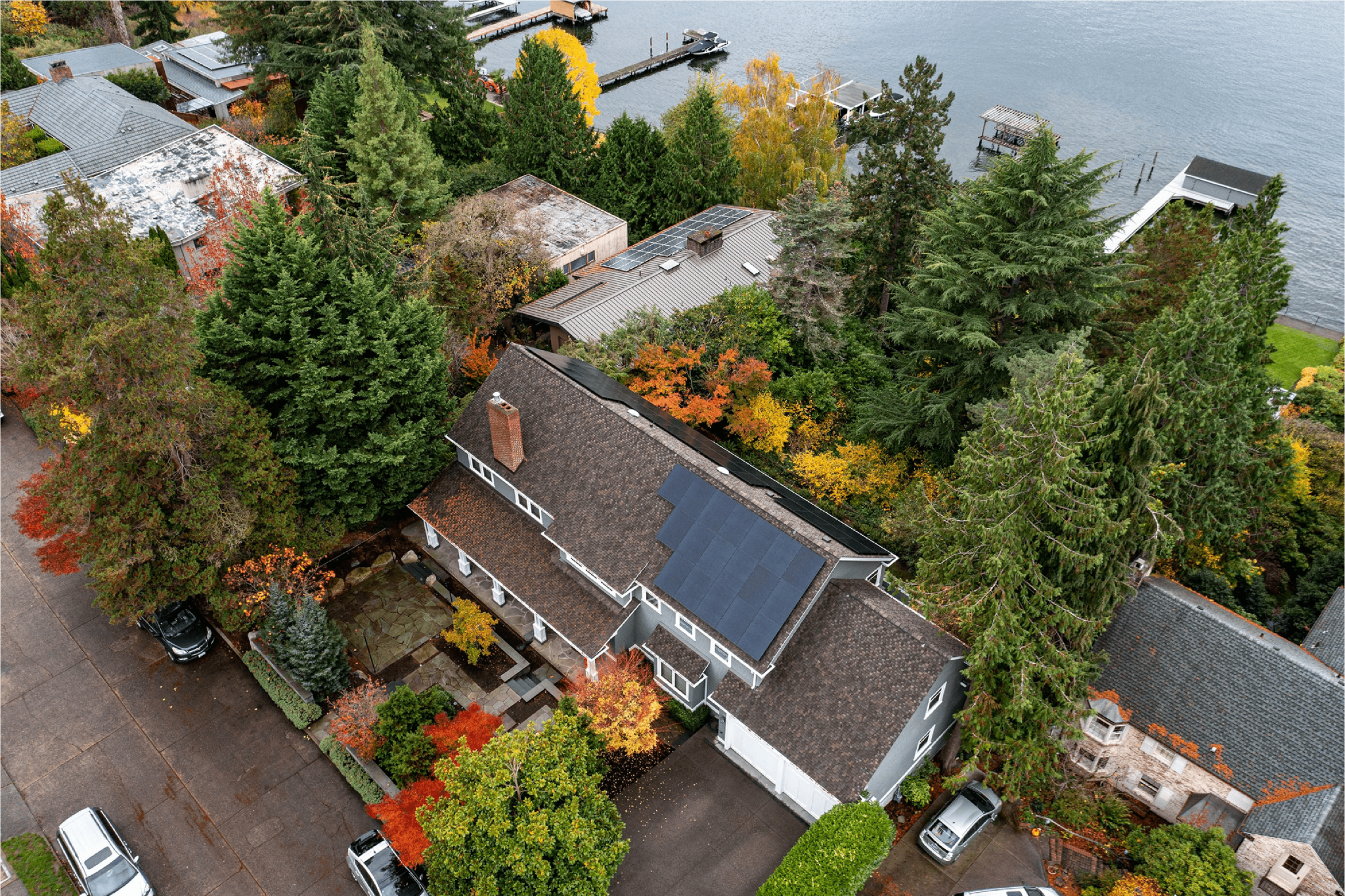 aerial view of residential homes with solar