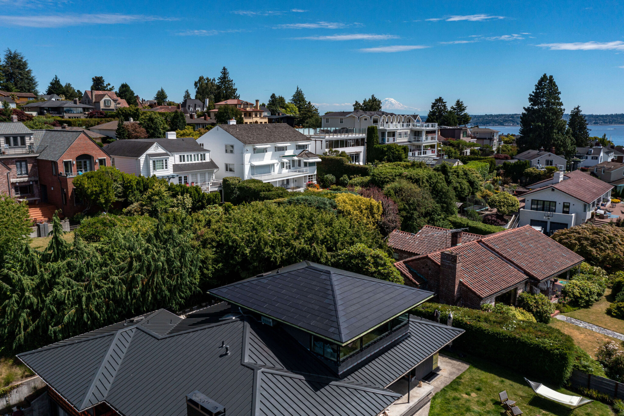 Tesla Solar Roof installation with Mt. Rainier in the background