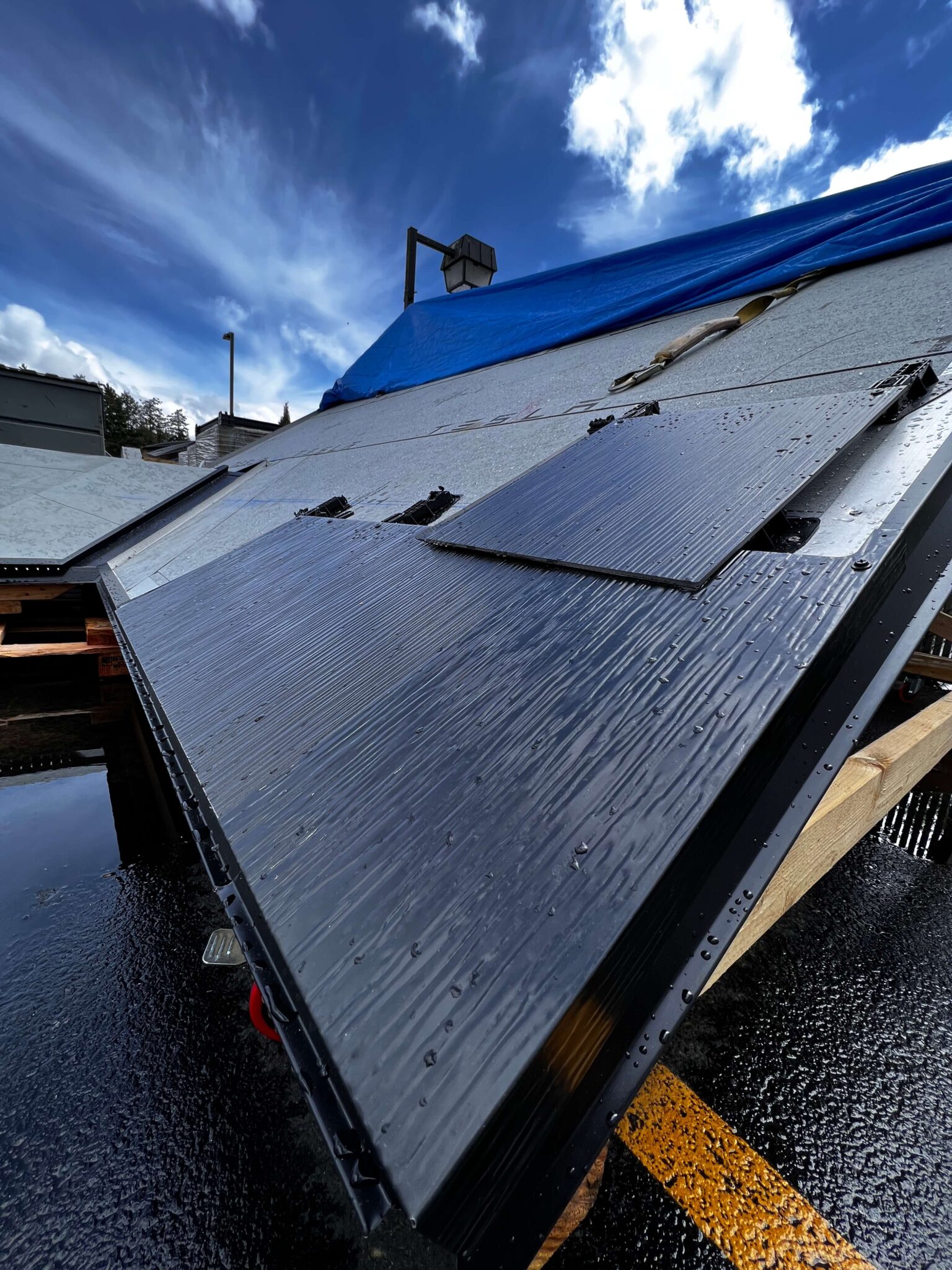 Tesla Solar Roof tile on mock roof for training