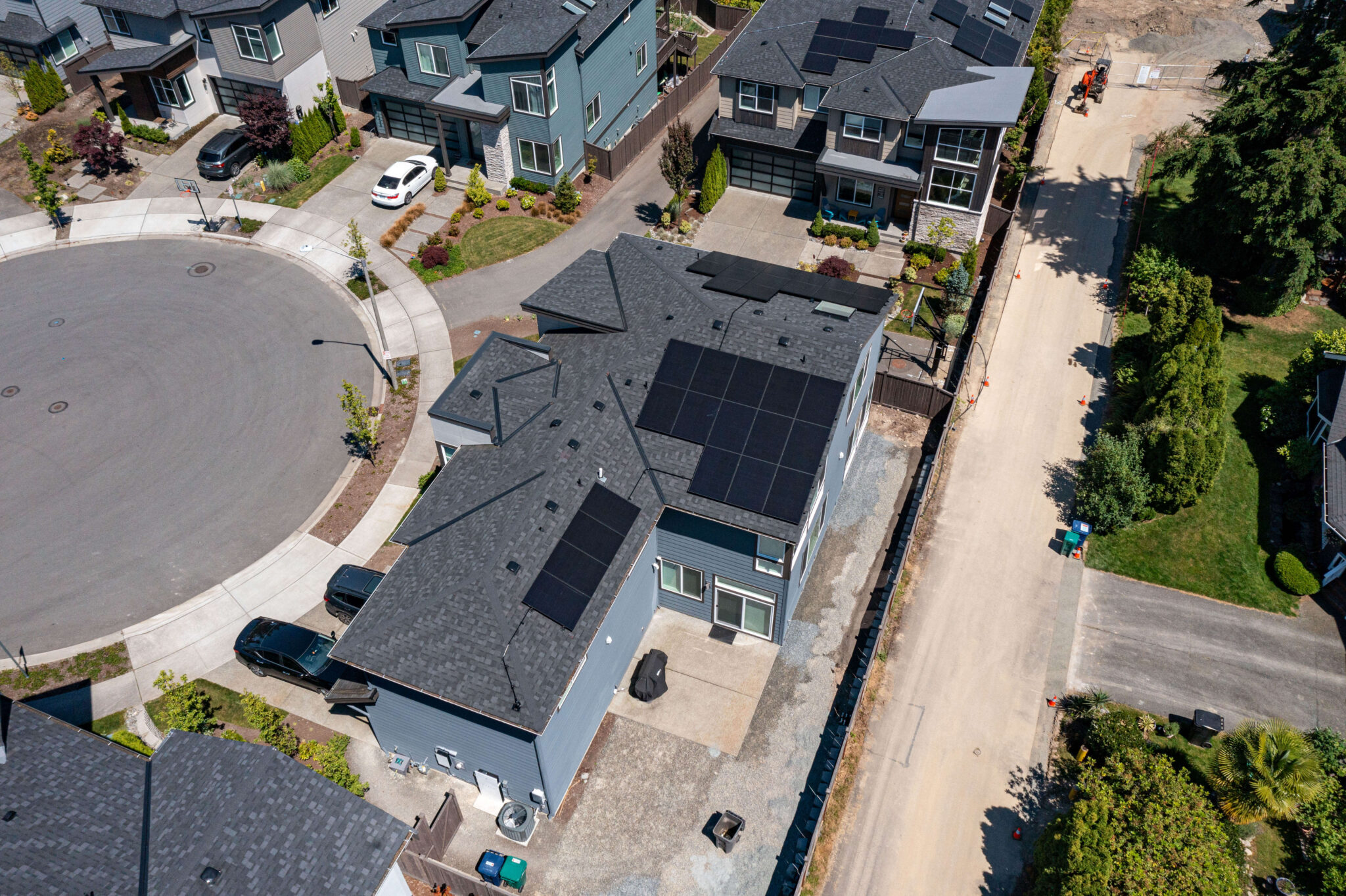 Solar and Tesla Powerwall Plus installation on suburban home in Eastside Washington